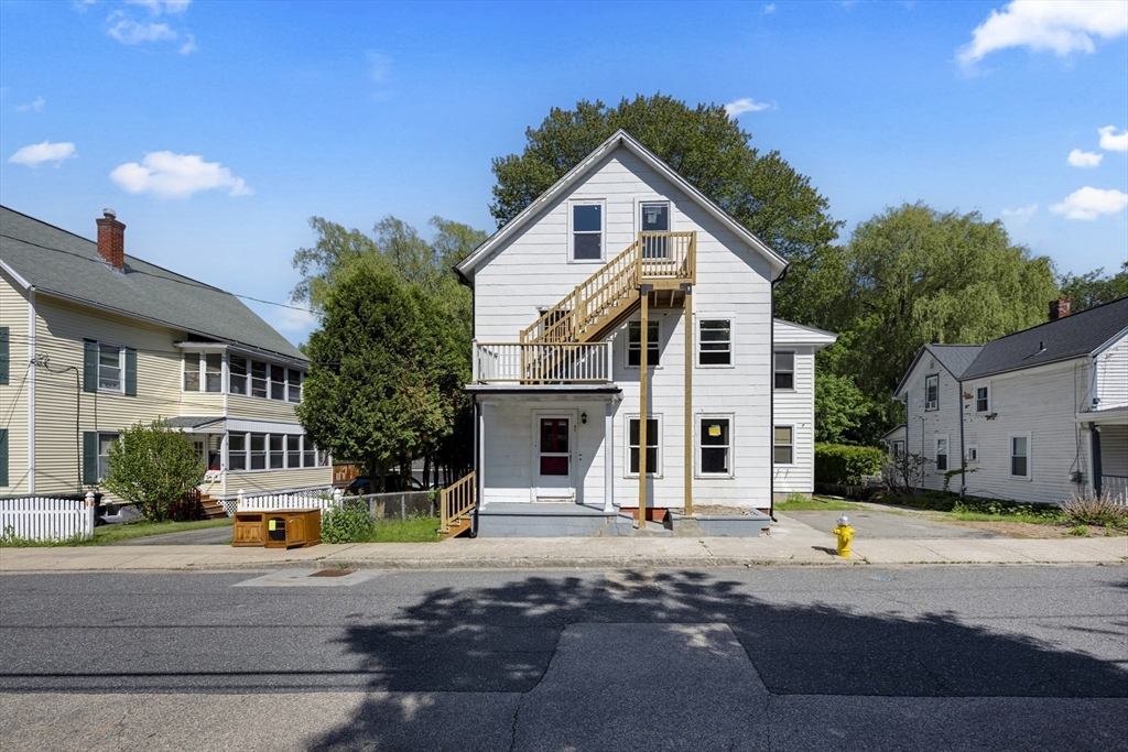 47 Morris Street Southbridge, MA 01550 - Photo 32 of 40 a front view of building with street