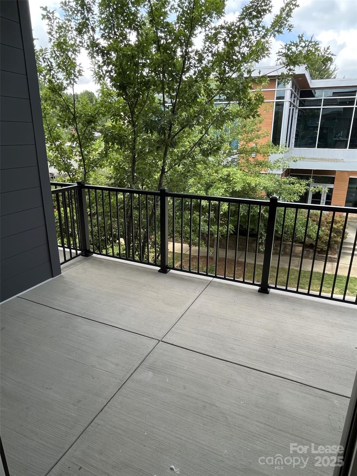 19546 Greentree Way, Unit 201 Cornelius, NC 28031 - Photo 15 of 31 a view of a balcony