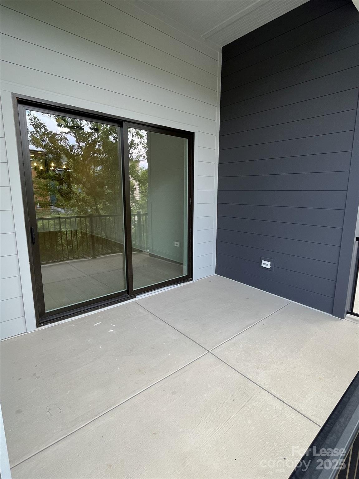 19546 Greentree Way, Unit 201 Cornelius, NC 28031 - Photo 16 of 31 a view of empty room with window
