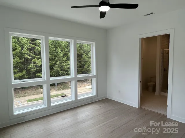 a bathroom with a sink a vanity and mirror