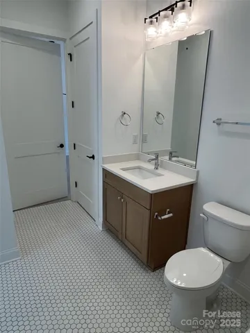 a bathroom with a bathtub and a toilet