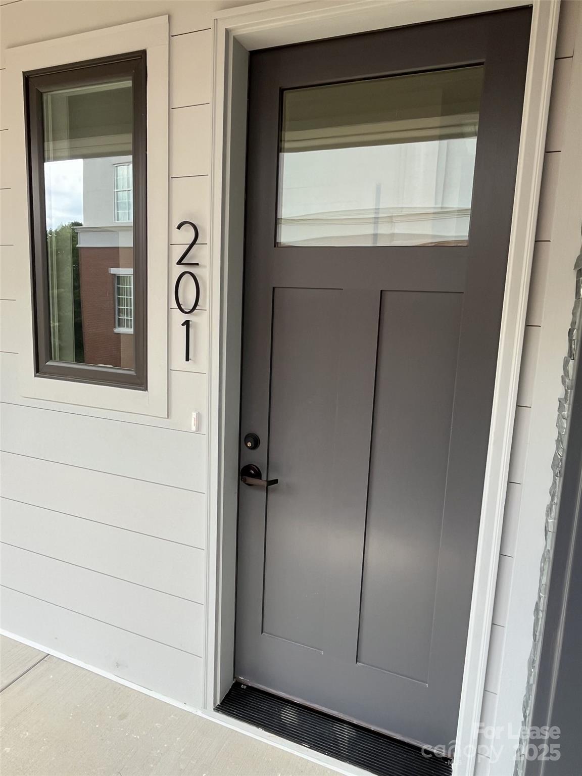 19546 Greentree Way, Unit 201 Cornelius, NC 28031 - Photo 5 of 31 a view of front door
