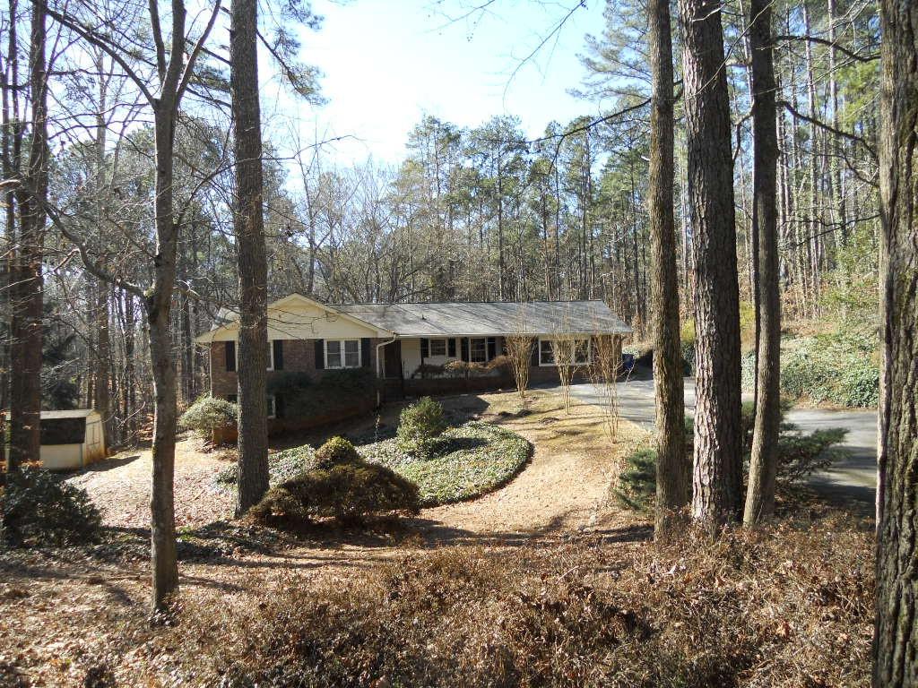 6053 Bowers Road Smoke Rise, GA 30087 - Photo 1 of 1 4 Sides Brick Ranch in Smoke Rise Community! Partial basement with one finished room and large workshop room. Situated on almost 2 beautiful acres. Renovate this house or build your dream home.