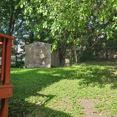 a view of a backyard with a garden