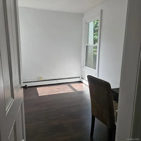 a close view of chair and table in a room