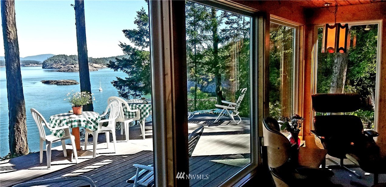 1327 Islandale Road Lopez Island, WA 98261 - Photo 1 of 22 a view of a balcony with potted plants