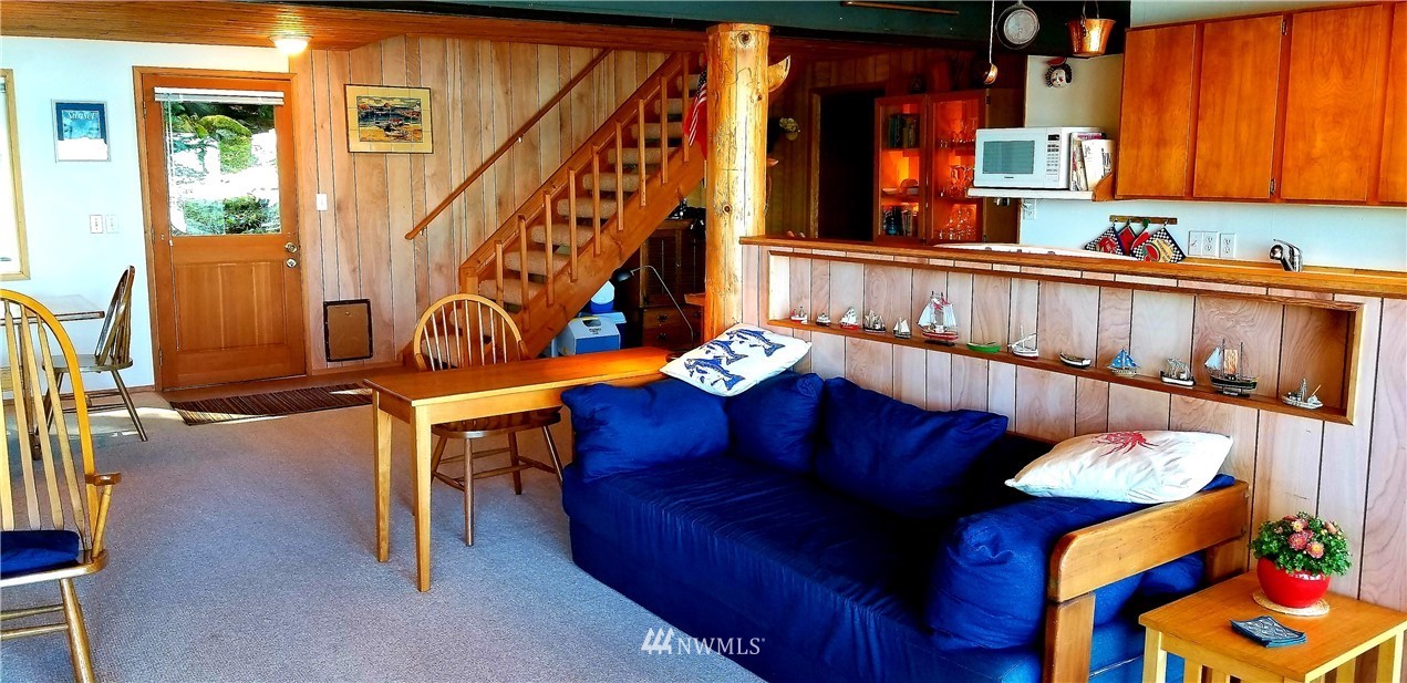 1327 Islandale Road Lopez Island, WA 98261 - Photo 11 of 22 a view of a living room and entryway with furniture