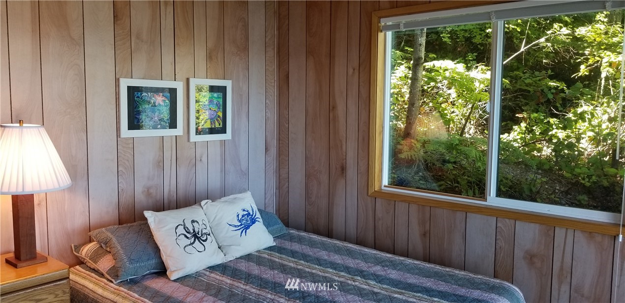 1327 Islandale Road Lopez Island, WA 98261 - Photo 18 of 22 a view of a wooden floor and a window