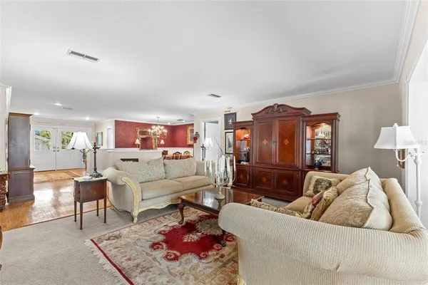 a living room with furniture and a couch