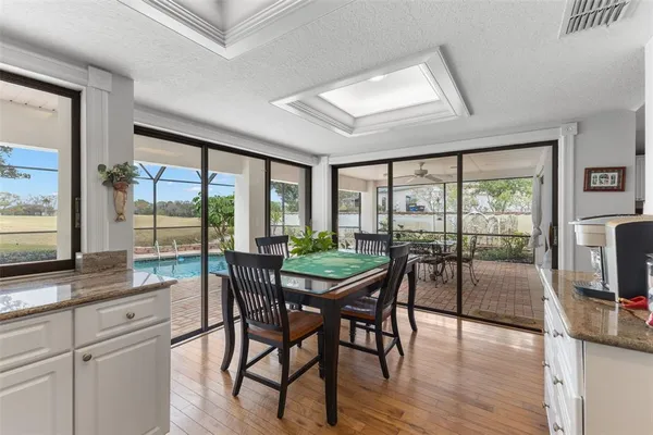 a kitchen with stainless steel appliances granite countertop a stove and a sink