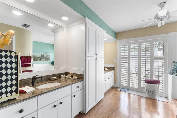 a room with furniture and a wooden floor