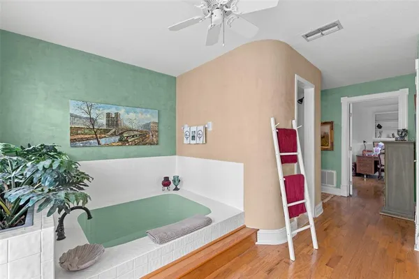 a view of a patio with a table chairs and a backyard