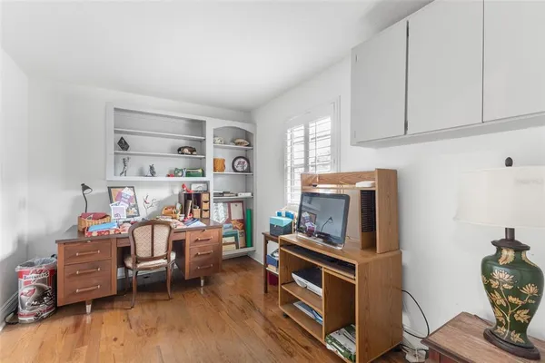 a view of a house with a swimming pool