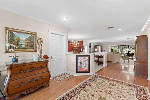 a bed room with a bed and a chandelier