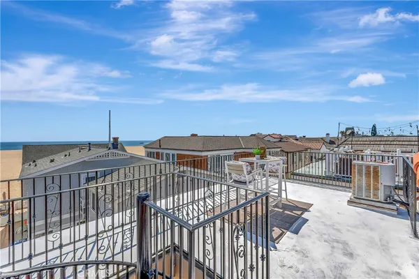 a view of a balcony with city view