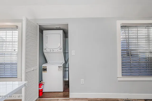 a garden with trees in front of it