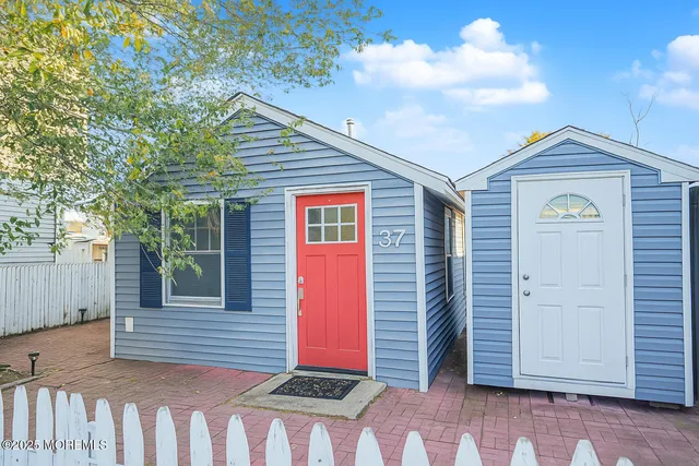 a front view of a house with a garage