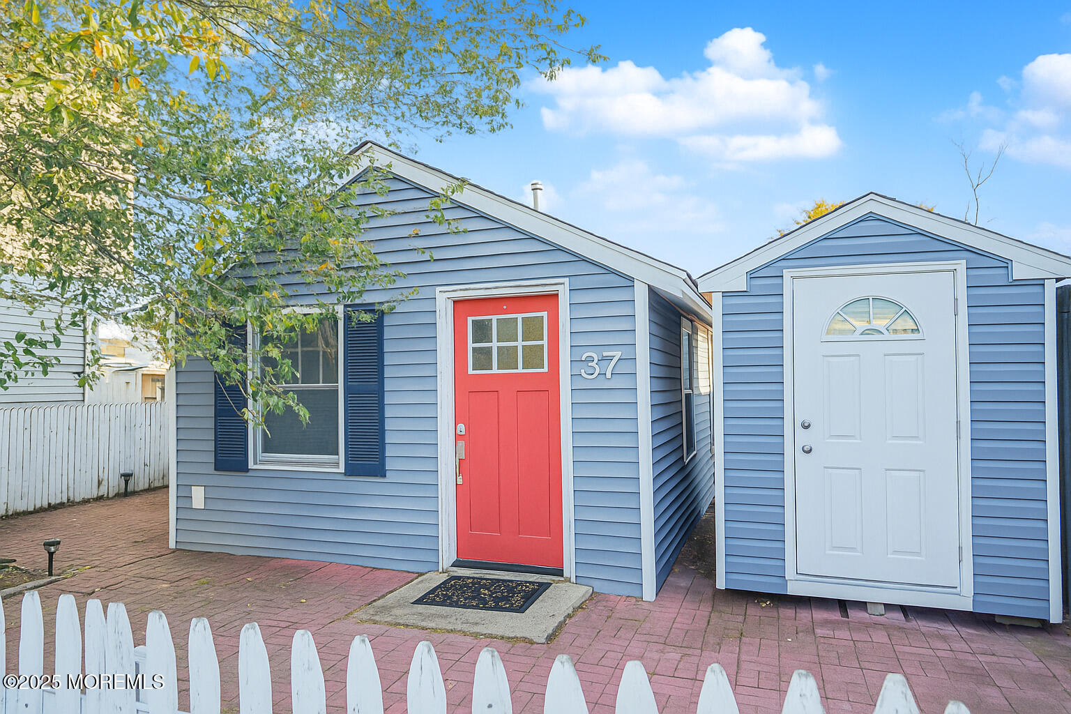 37 Myrtle Avenue Keyport, NJ 07735 - Photo 2 of 16 a front view of a house with a garage