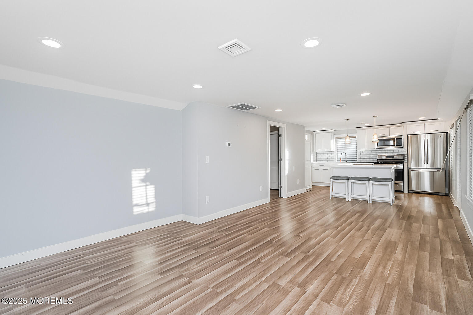 37 Myrtle Avenue Keyport, NJ 07735 - Photo 3 of 16 a view of kitchen and empty room with wooden floor
