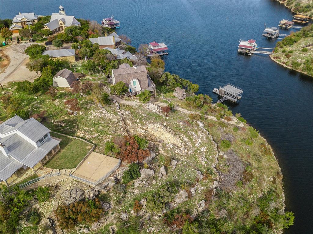 1040 Bluff Creek Point Strawn, TX 76475 - Photo 23 of 30 a bathroom with a sink toilet and a mirror