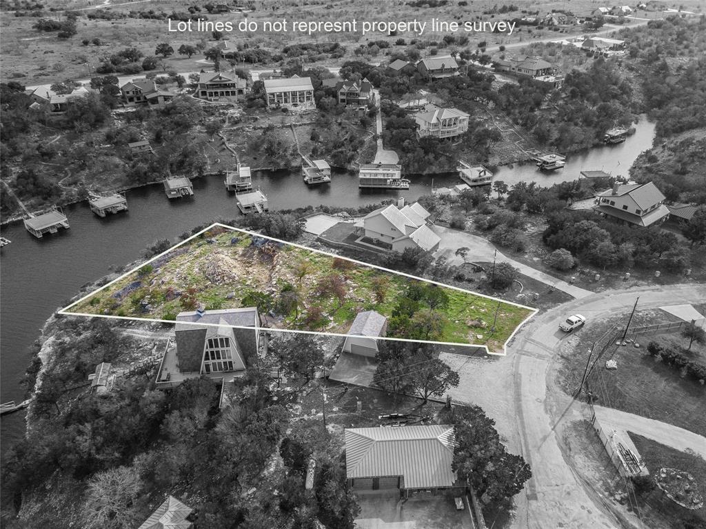 1040 Bluff Creek Point Strawn, TX 76475 - Photo 4 of 30 an aerial view of a house with a yard