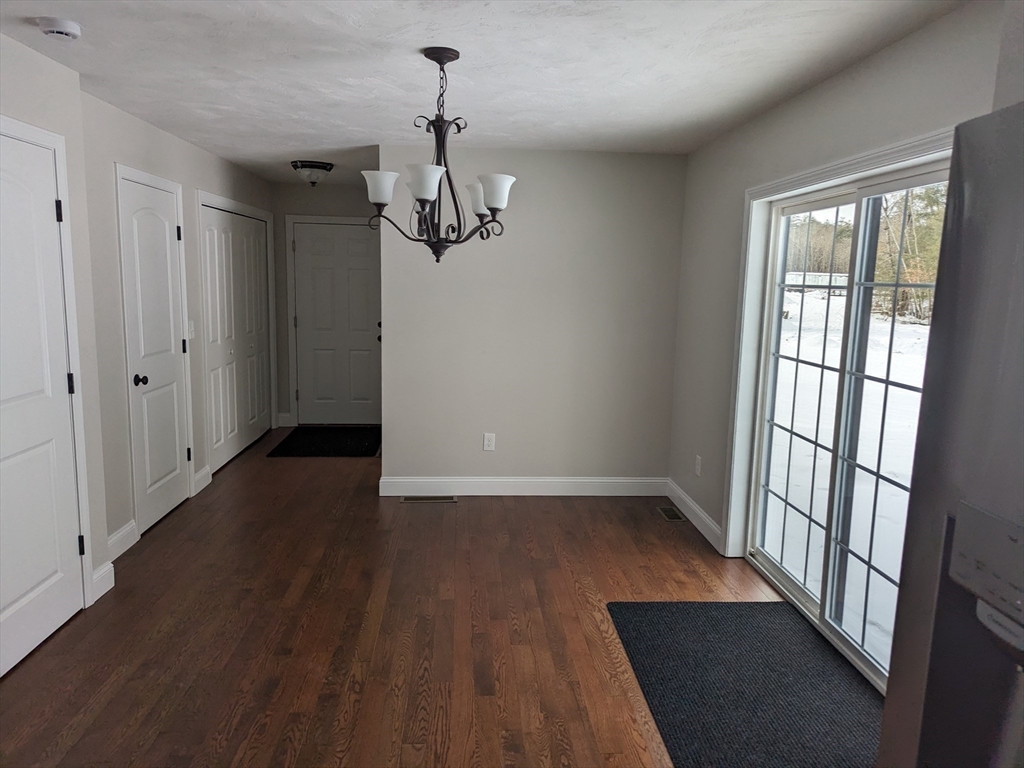 Lot 5-510 Old County Road Wales, MA 01081 - Photo 9 of 32 wooden floor in an empty room with a window