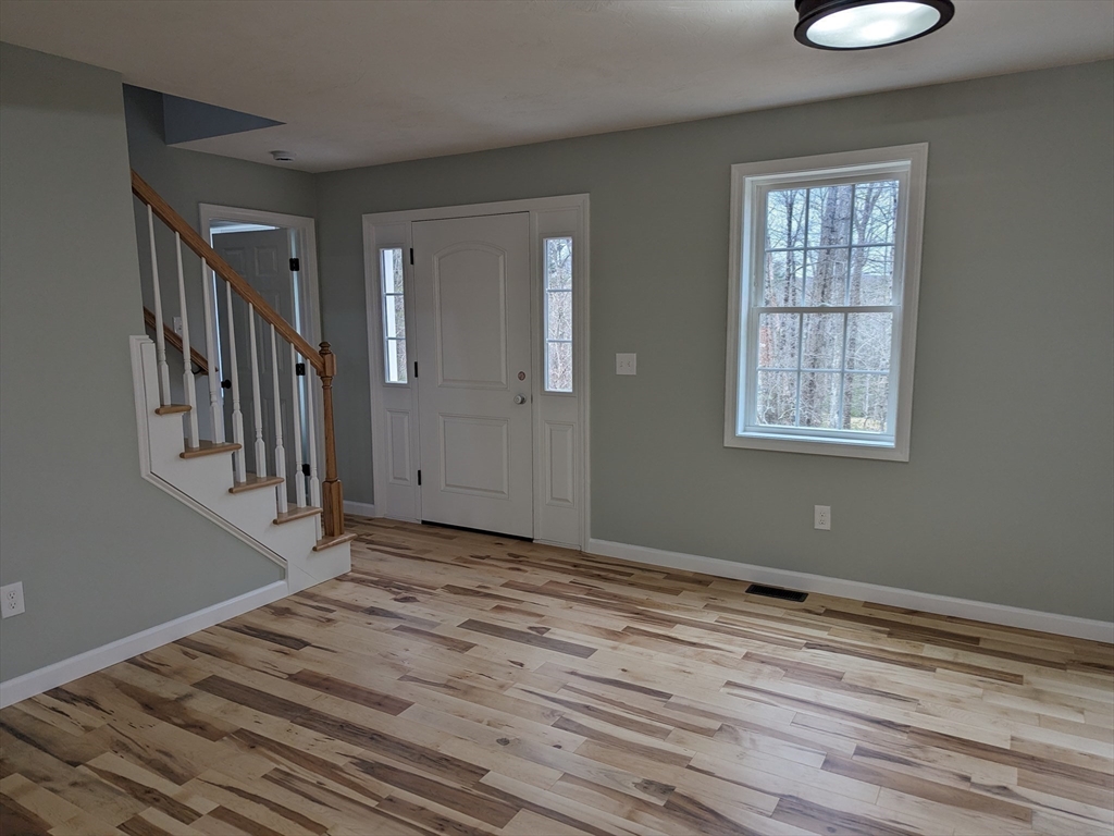 Lot 5-510 Old County Road Wales, MA 01081 - Photo 10 of 32 a view of an empty room with wooden floor and a window