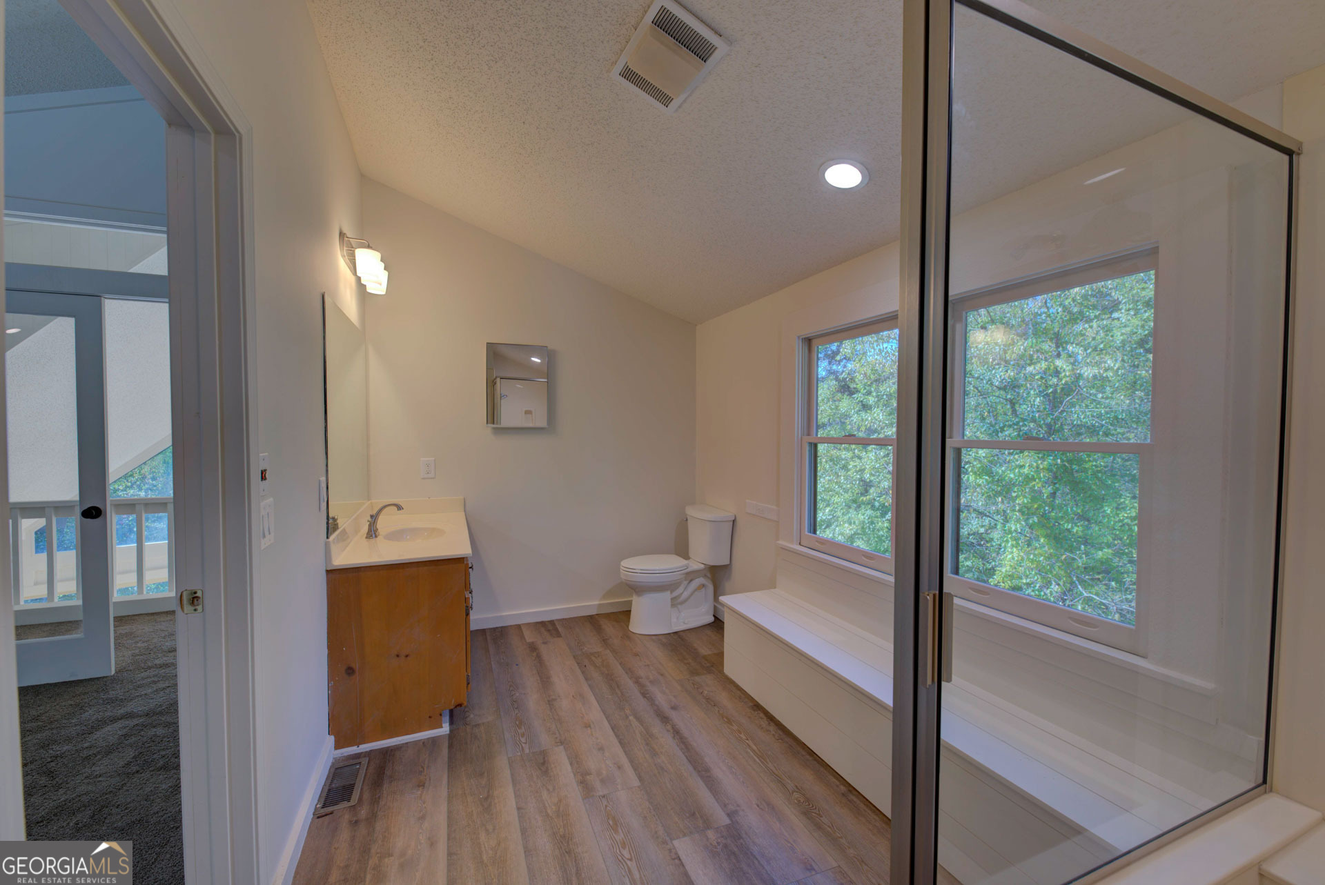 1799 Seed Lake Road Lakemont, GA 30552 - Photo 12 of 42 a view of a room with wooden floor and furniture