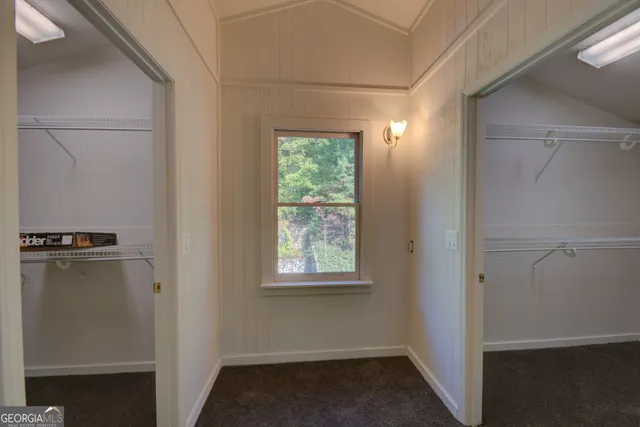 a view of a hardwood & an empty room