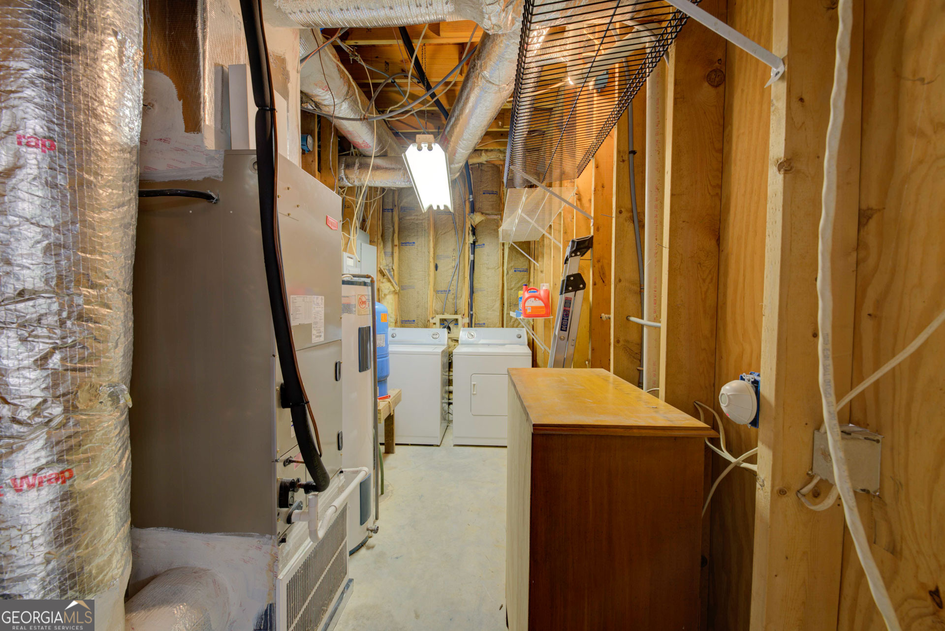 1799 Seed Lake Road Lakemont, GA 30552 - Photo 27 of 42 a bathroom with a sink and mirror with bathtub