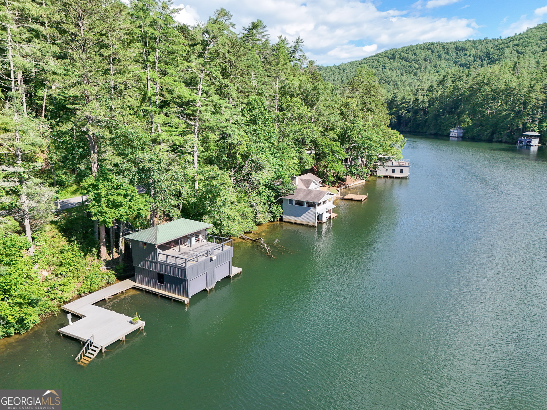 1799 Seed Lake Road Lakemont, GA 30552 - Photo 29 of 42 a bed is sitting in the middle of a lake