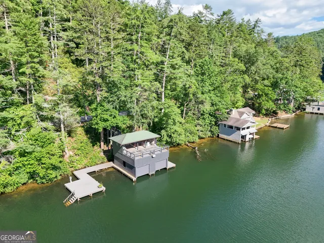 a house with a yard and garage