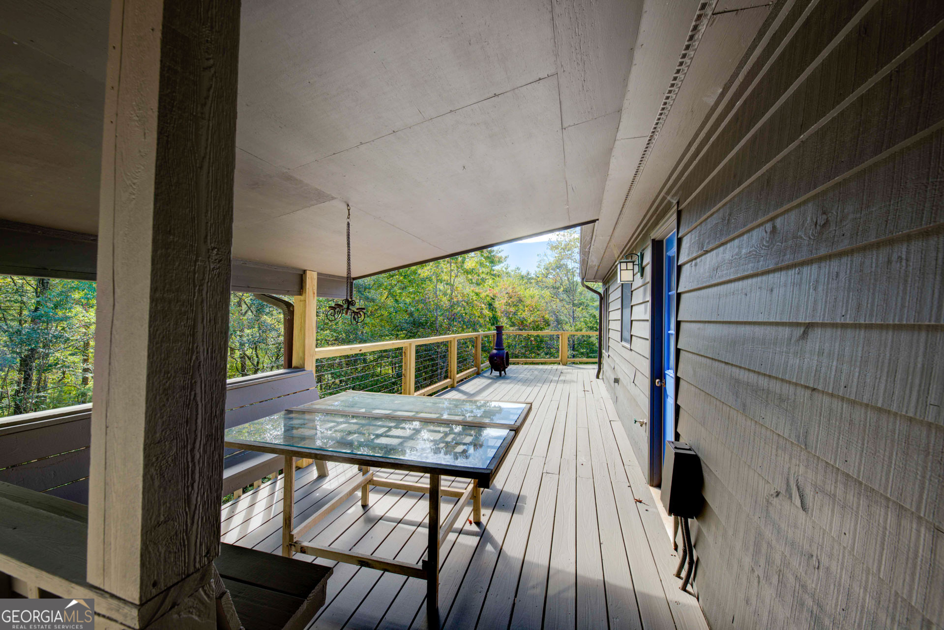 1799 Seed Lake Road Lakemont, GA 30552 - Photo 39 of 42 a view of backyard with a patio and wooden floor
