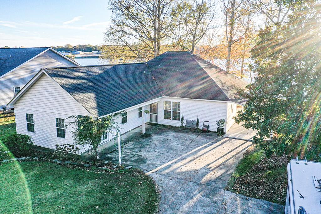 986 Ridgewood Harbor Road Waterloo, SC 29384 - Photo 1 of 43 a house view with a garden space