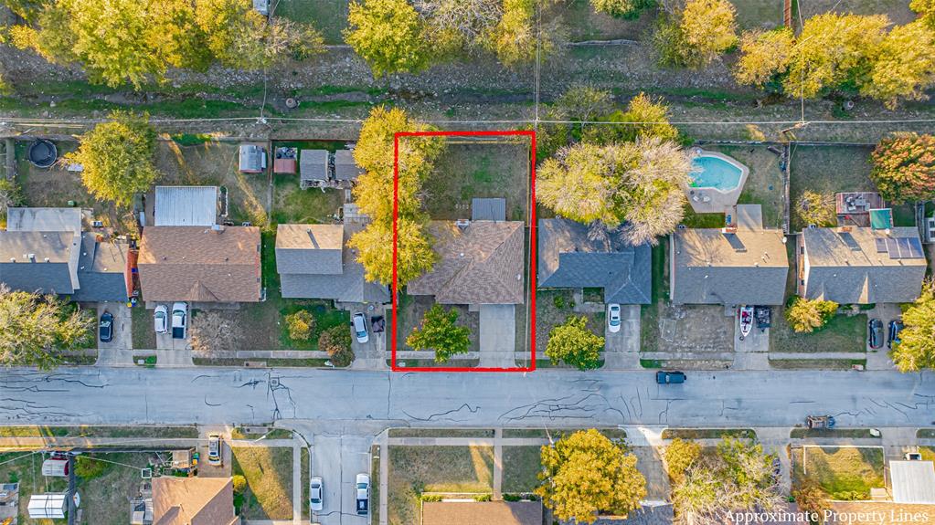 6901 Bennington Drive Watauga, TX 76148 - Photo 34 of 36 a bunch of flowers in front of building