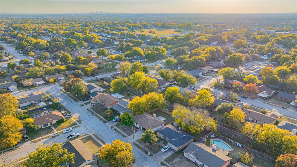 6901 Bennington Drive Watauga, TX 76148 - Photo 35 of 36 an aerial view of residential house with parking