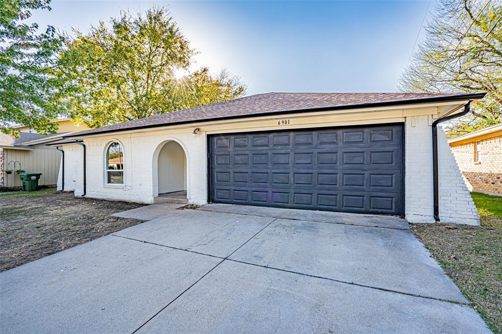 6901 Bennington Drive Watauga, TX 76148 - Photo 4 of 36 a view of backyard of house