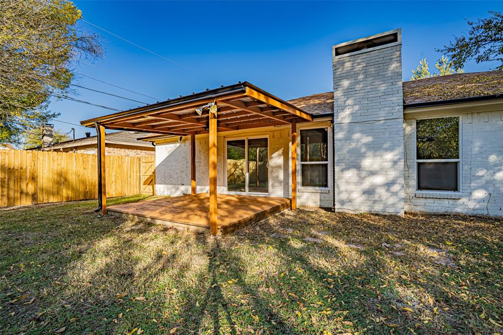 6901 Bennington Drive Watauga, TX 76148 - Photo 7 of 36 a front view of a house with a yard
