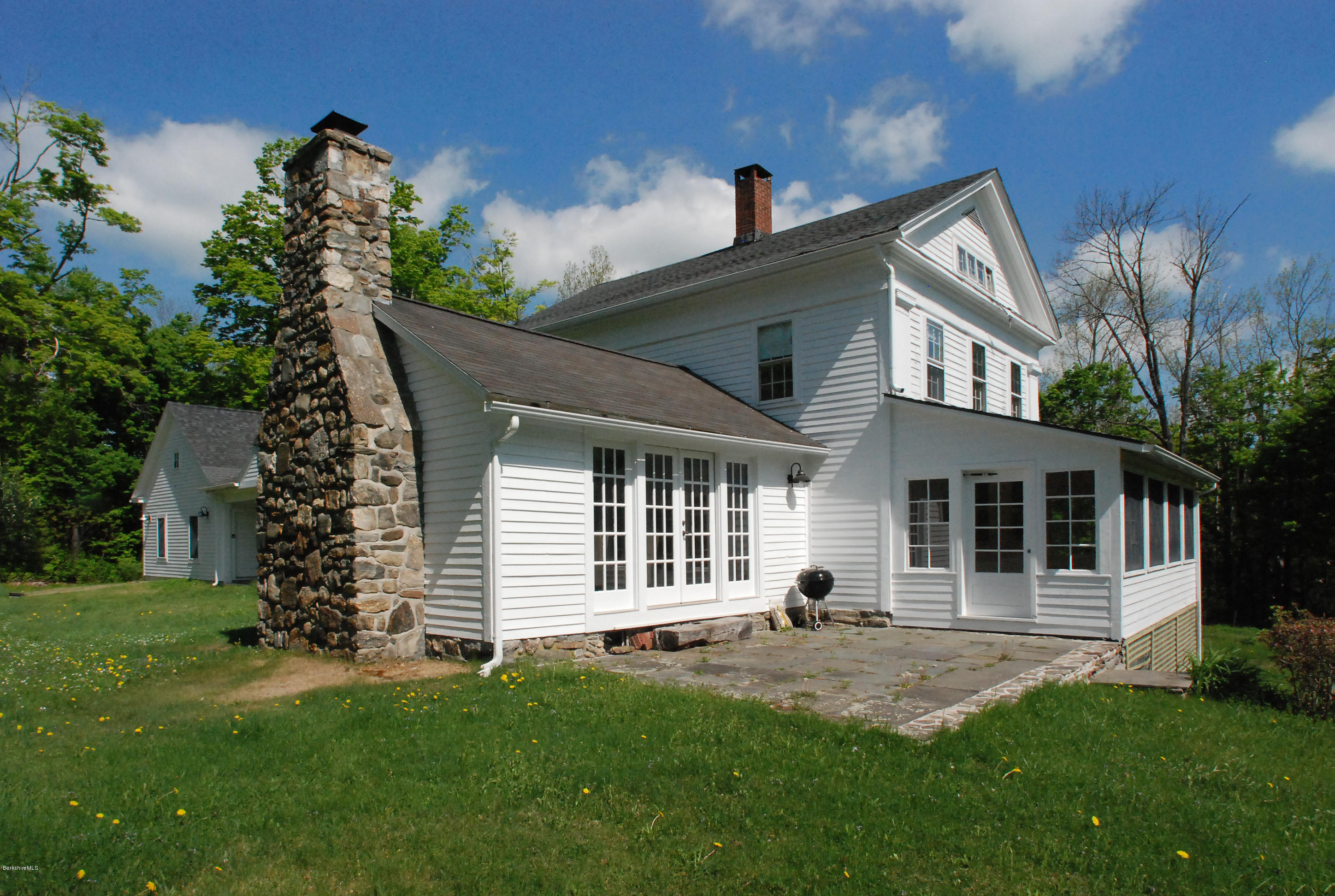 176 Sandisfield Road Sandisfield, MA 01255 - Photo 1 of 28 a house view with a garden space