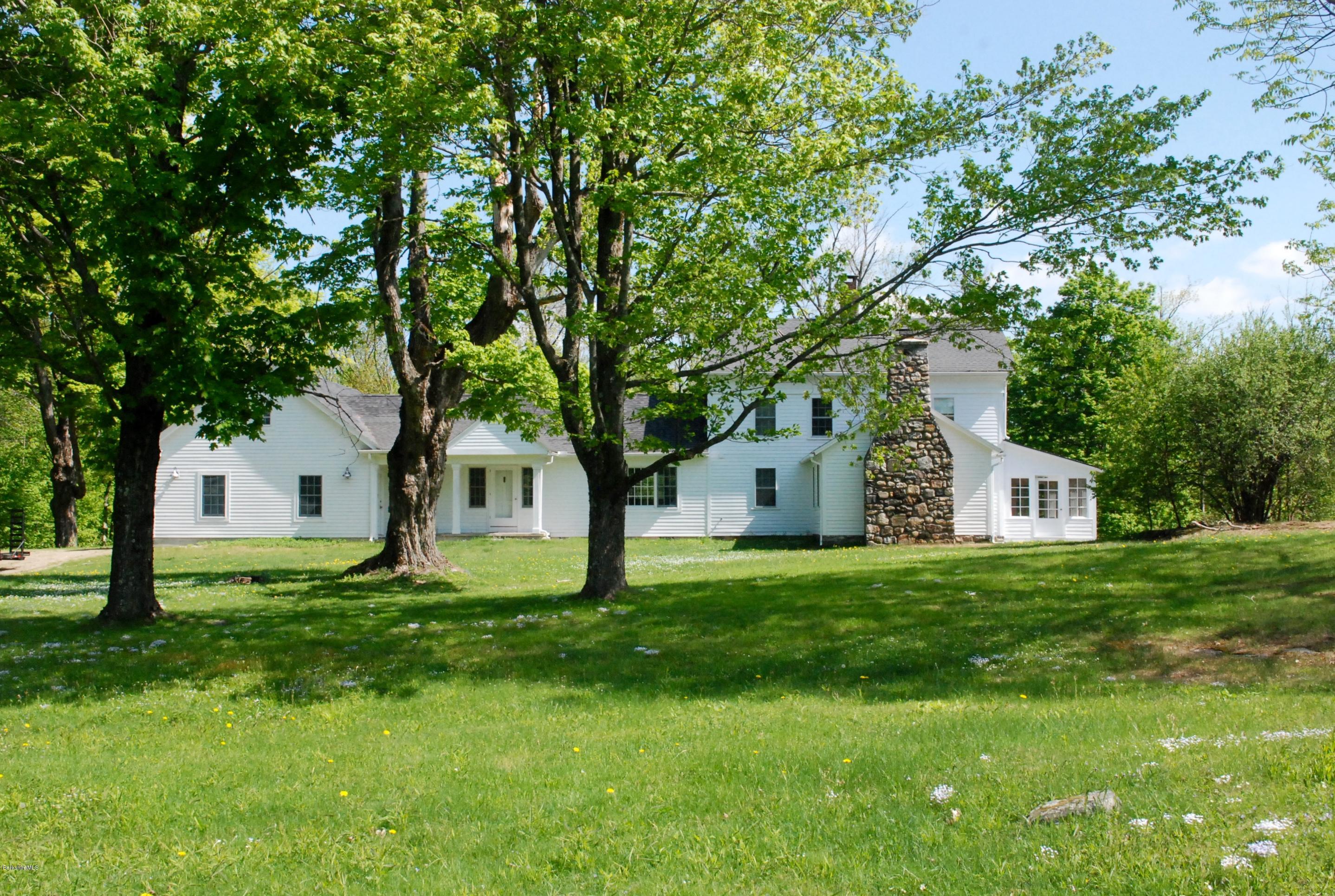 176 Sandisfield Road Sandisfield, MA 01255 - Photo 2 of 28 a house view with a garden and trees