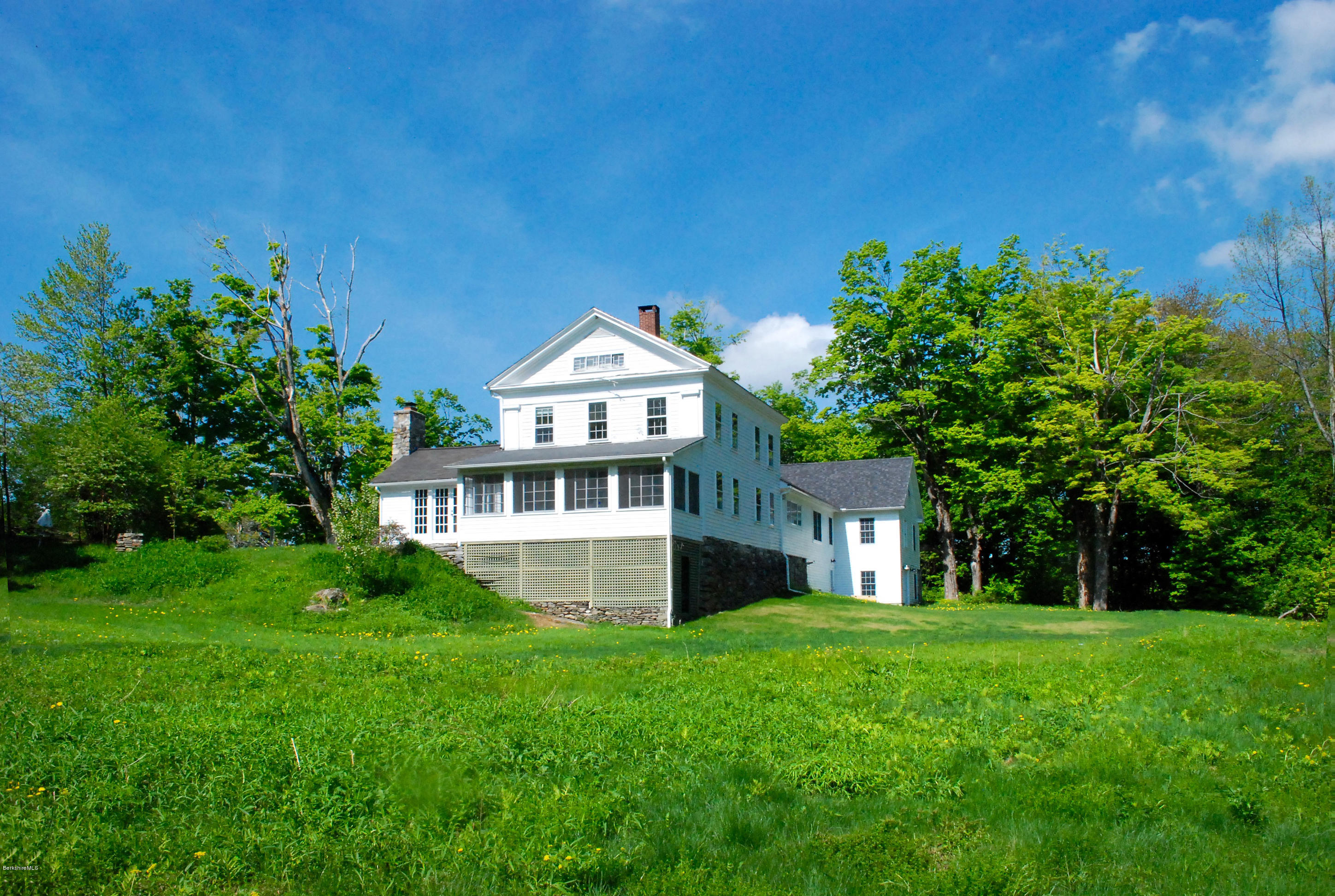 176 Sandisfield Road Sandisfield, MA 01255 - Photo 28 of 28 a front view of a house with a yard
