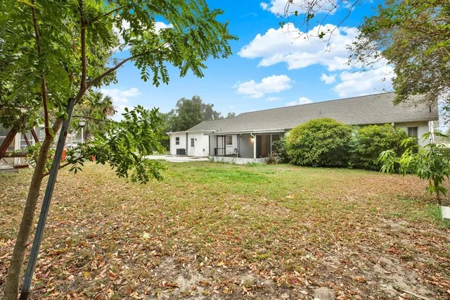 a house with garden in front of it