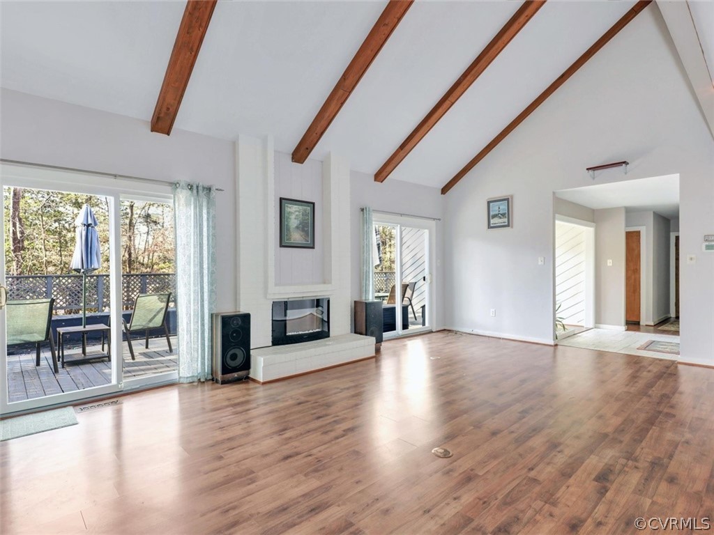 3822 Timber Ridge Road Midlothian, VA 23112 - Photo 11 of 38 a view of a livingroom with furniture wooden floor and windows