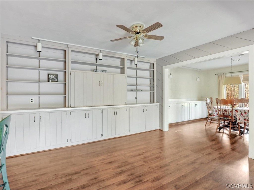 3822 Timber Ridge Road Midlothian, VA 23112 - Photo 17 of 38 a view of a livingroom with wooden floor and cabinet with wooden floor