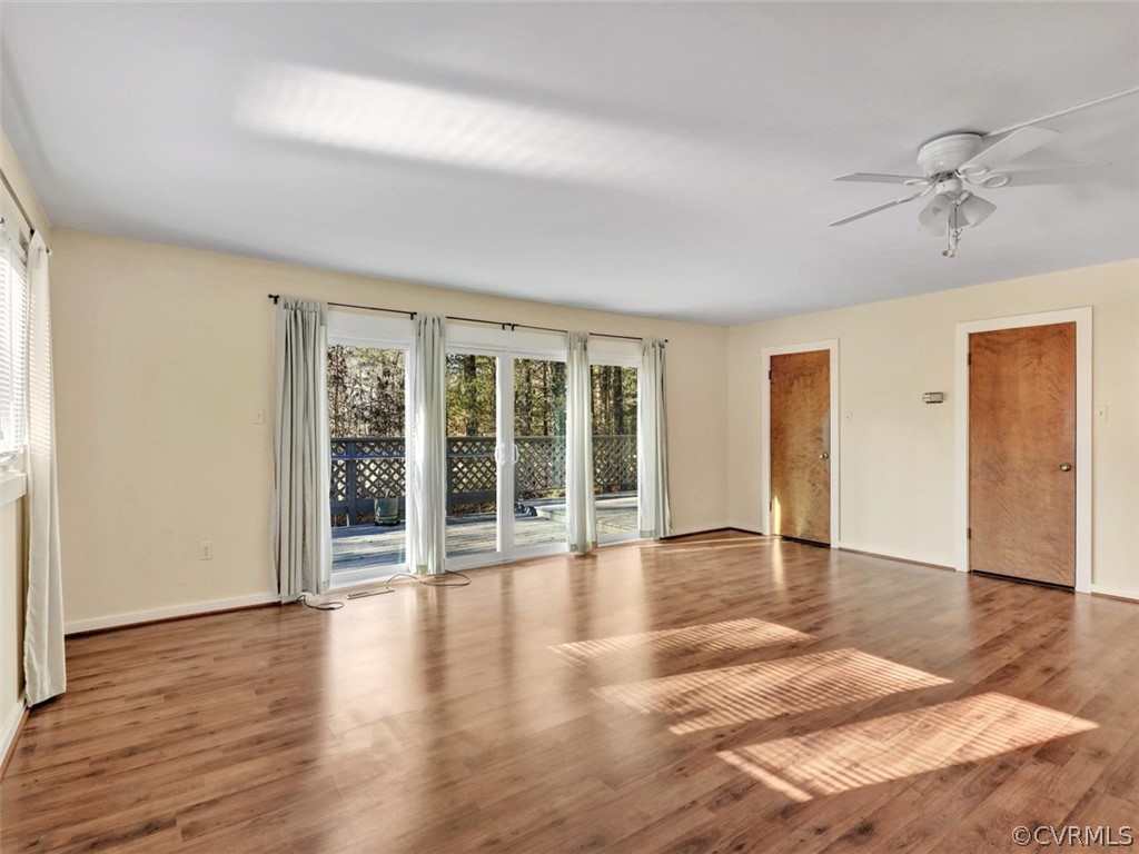 3822 Timber Ridge Road Midlothian, VA 23112 - Photo 20 of 38 wooden floor in an empty room with a window