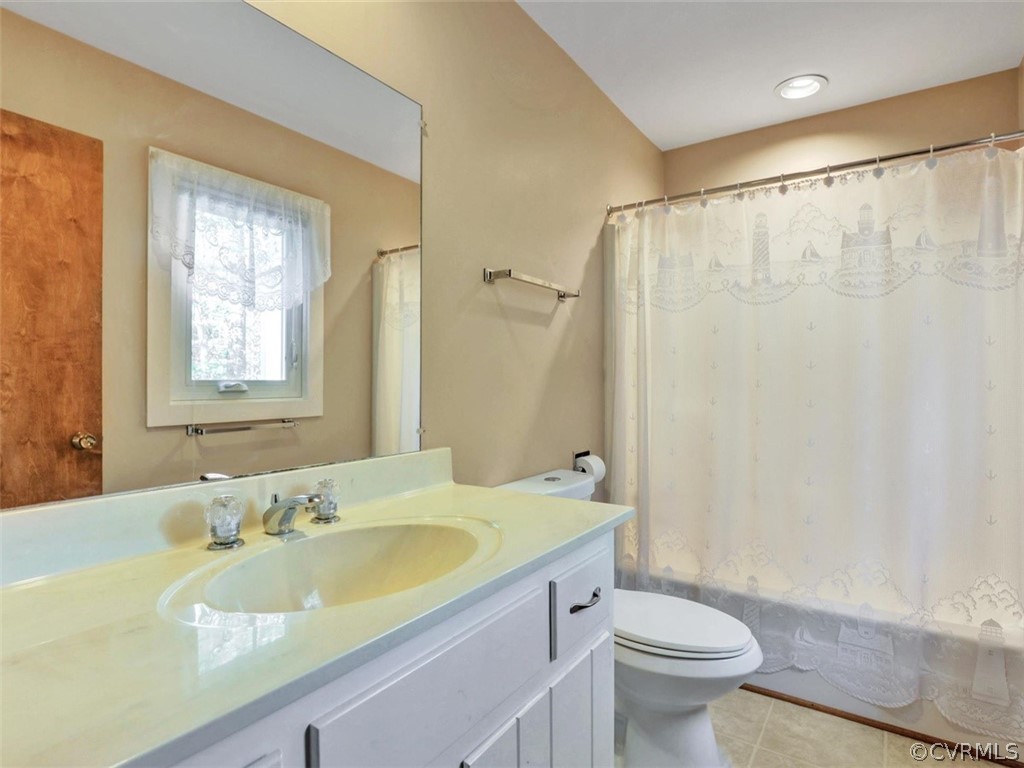 3822 Timber Ridge Road Midlothian, VA 23112 - Photo 26 of 38 a bathroom with a granite countertop sink toilet and shower