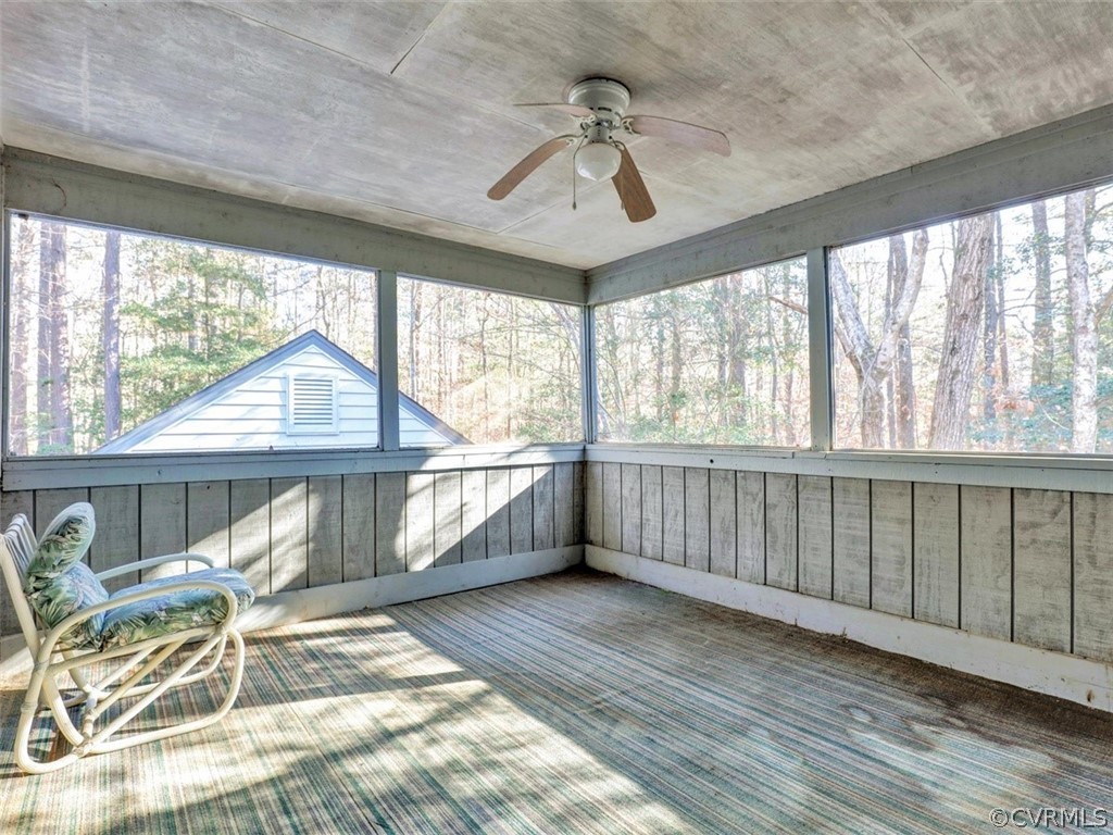 3822 Timber Ridge Road Midlothian, VA 23112 - Photo 34 of 38 a view of a porch with furniture and wooden floor