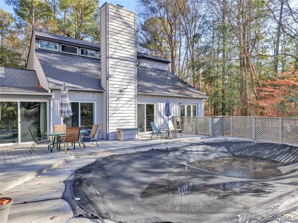 3822 Timber Ridge Road Midlothian, VA 23112 - Photo 38 of 38 a front view of a house with sitting area and garden
