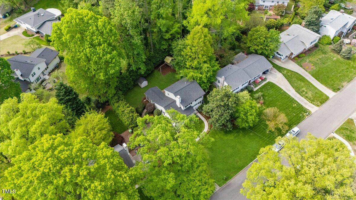 1008 Winona Road Raleigh, NC 27609 - Photo 53 of 62 an aerial view of residential house with outdoor space and trees all around