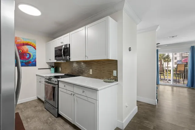a kitchen with a stove and a sink